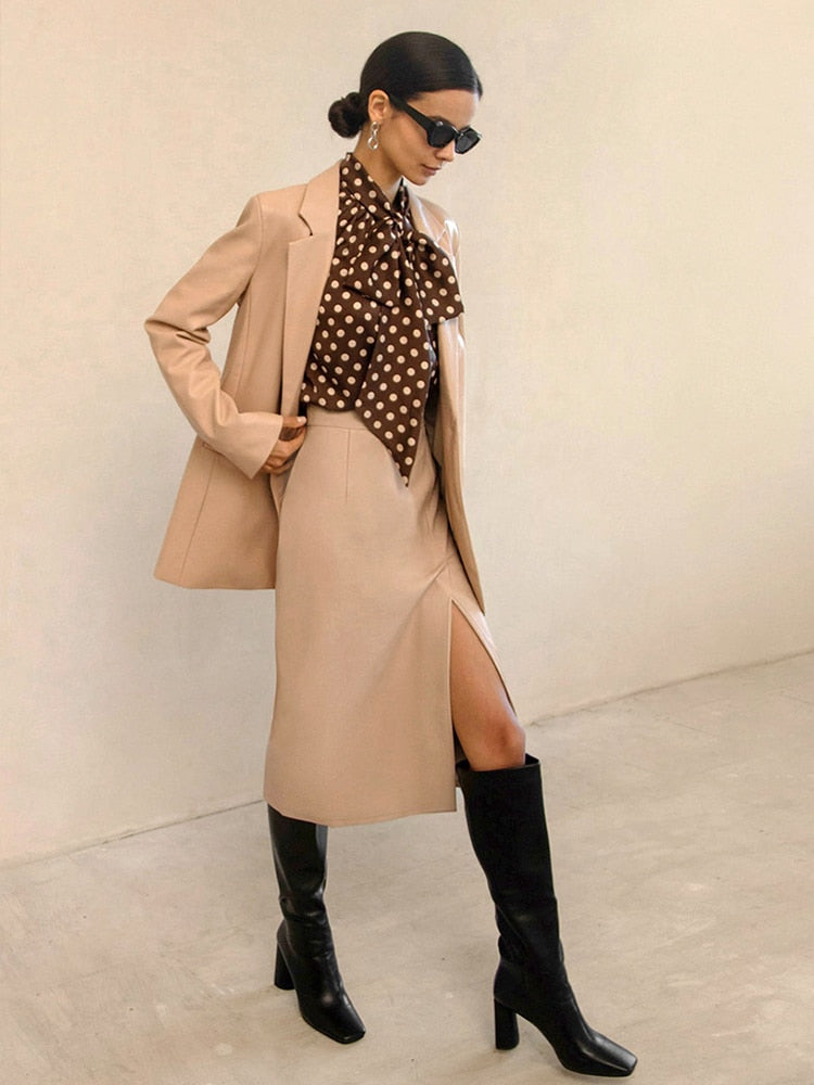 Vibonanza | Zwarte Leren Midi Rok met Sexy Split