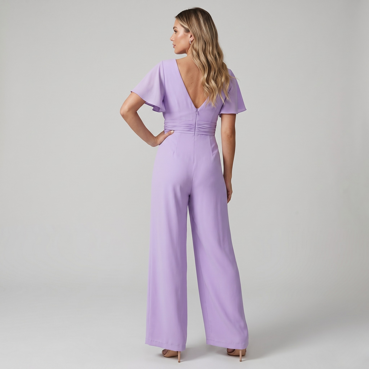 Vibonanza | Roze V-hals Jumpsuit met Brede Pijpen en Verstelbare Taille
